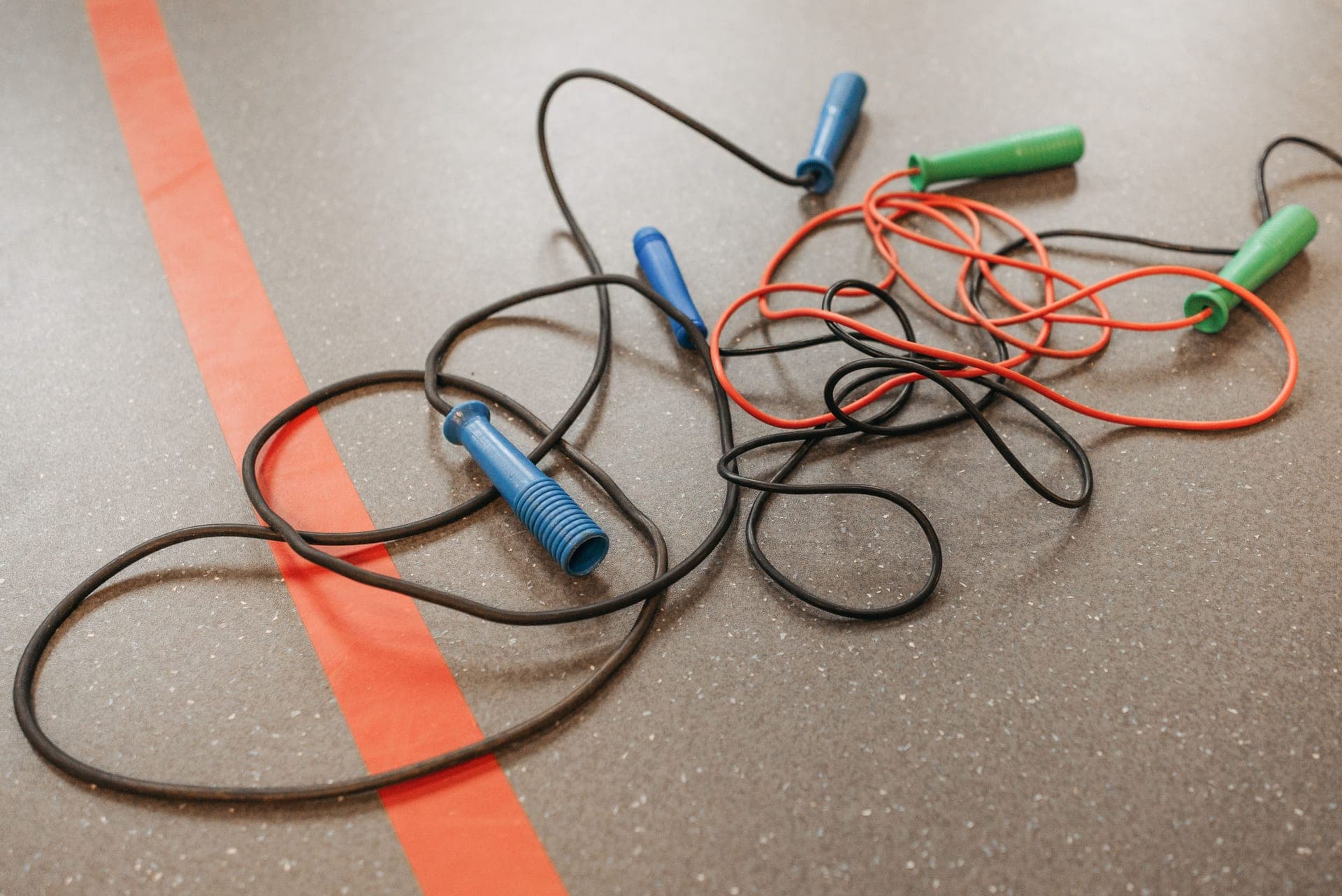 Jump ropes on a gym floor